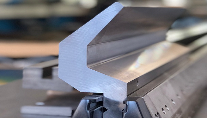 A precision TRUMPF / WILA punch with a sharp, acute angle for fine, detailed bends in sheet metal
